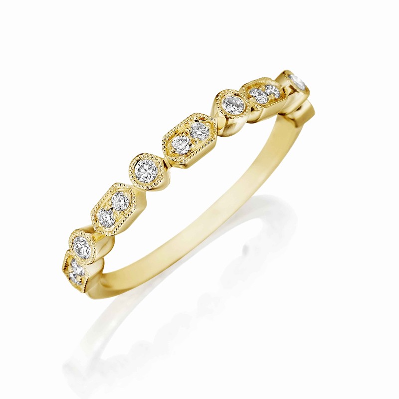 Henri Daussi yellow gold band featuring round brilliant white diamonds with milgrain detail.