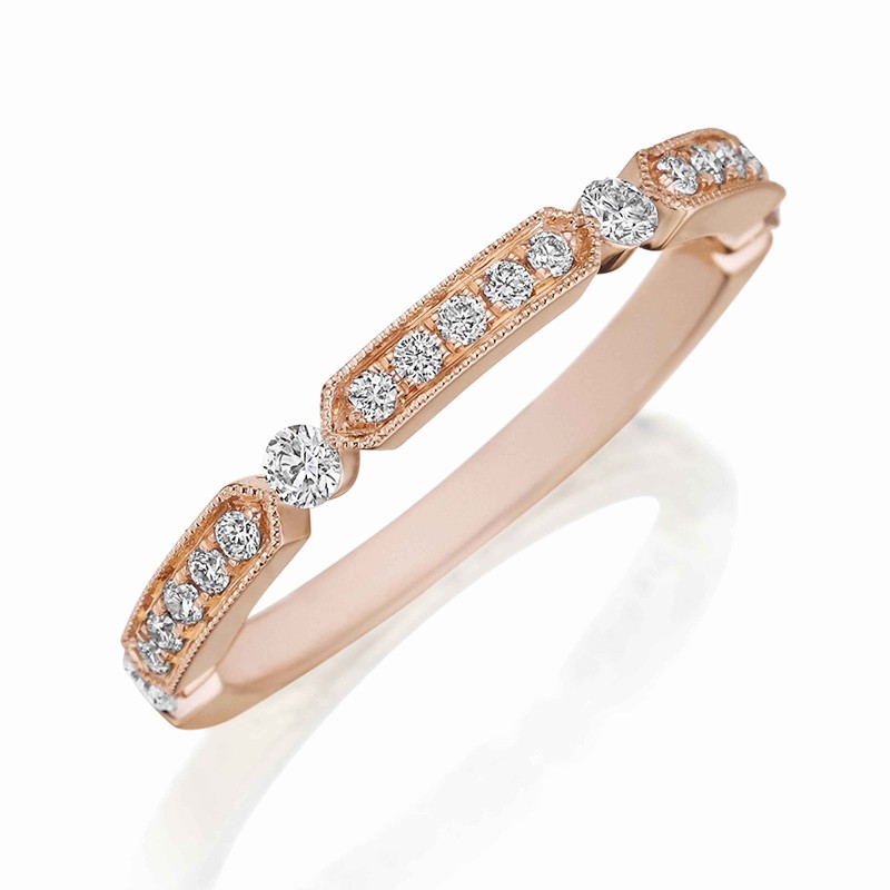 Henri Daussi rose gold band featuring alternating sections of round brilliant white diamonds and round brilliant white diamonds set with a milgrain detail
